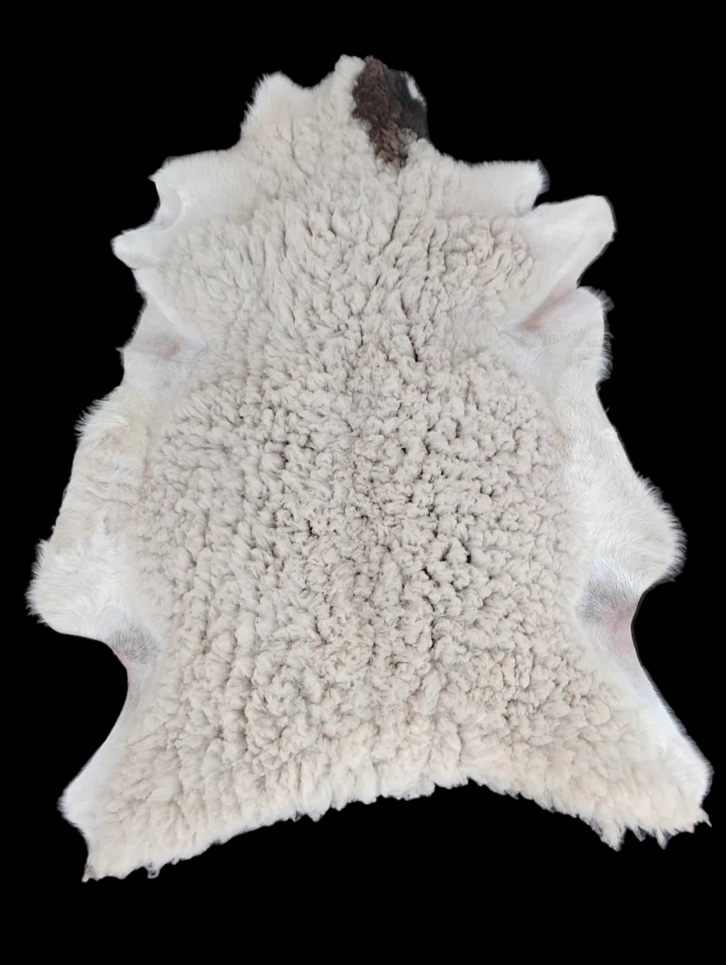 Bark tanned sheepskin 37 x 30 / silky wool and hair