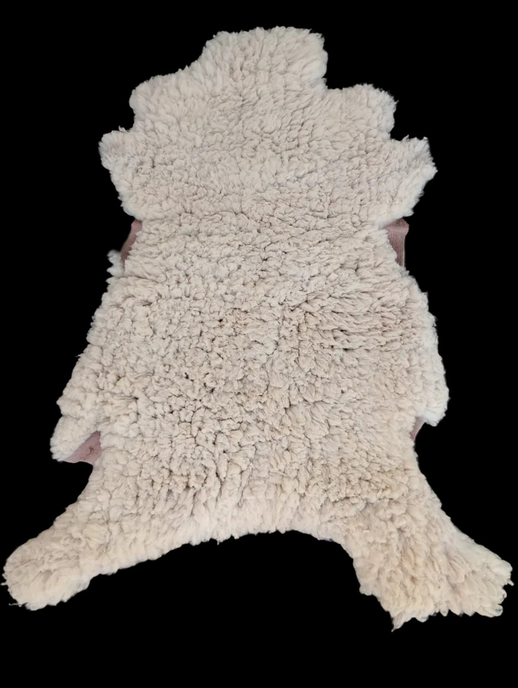 Bark tanned sheepskin 43 x 26 / medium dense silky wool