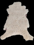 Bark tanned sheepskin 43 x 26 / medium dense silky wool