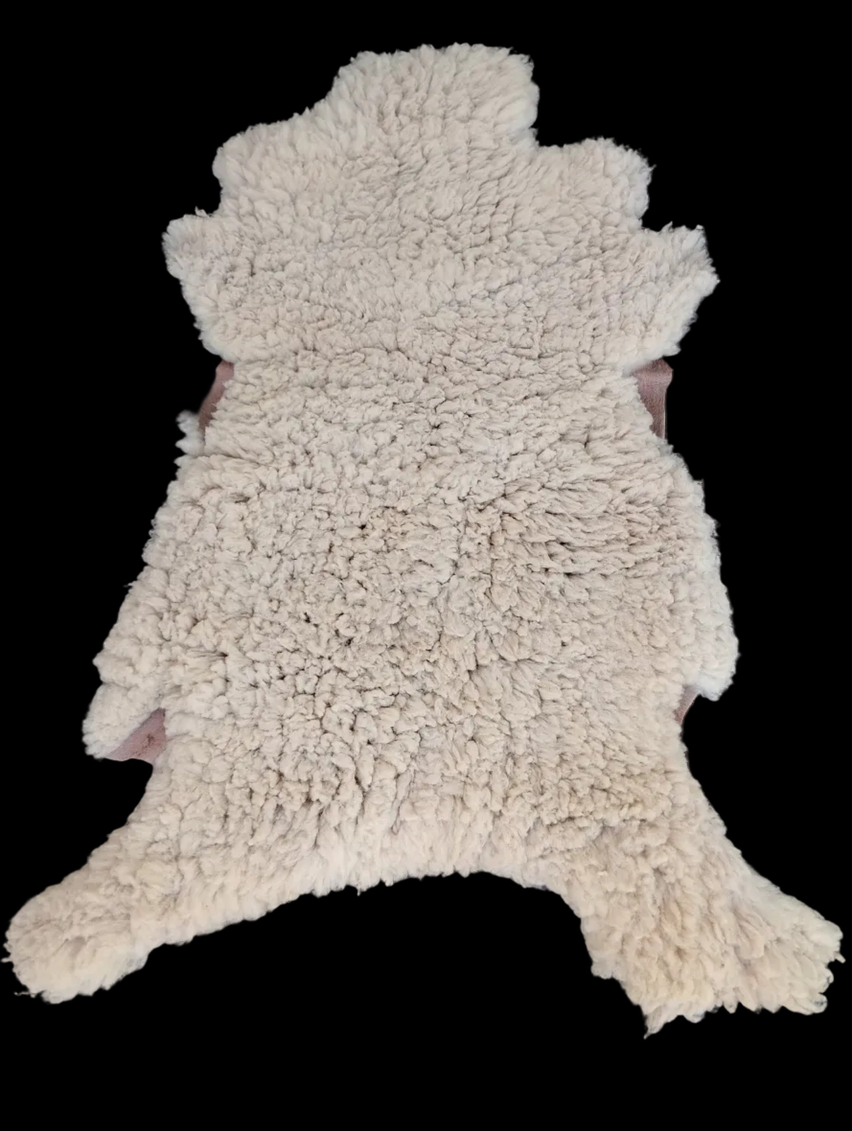 Bark tanned sheepskin 43 x 26 / medium dense silky wool