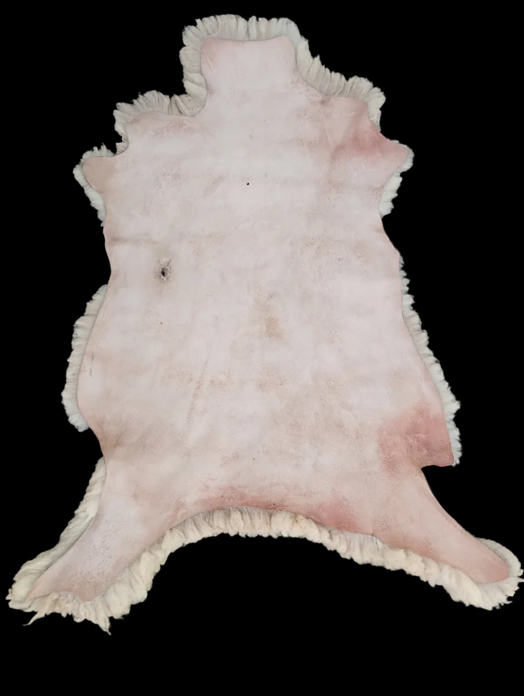 Bark tanned sheepskin 43 x 26 / medium dense silky wool