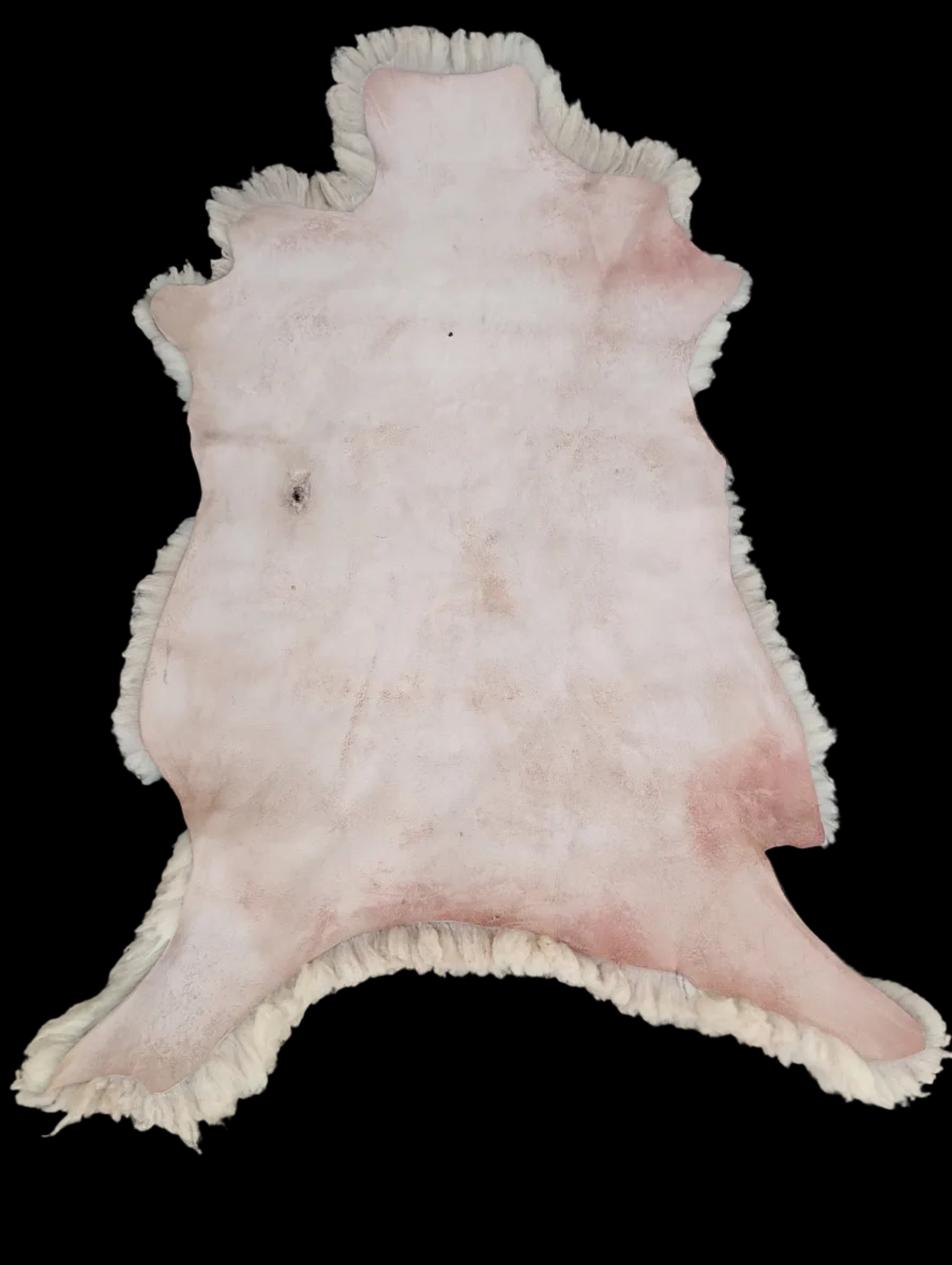 Bark tanned sheepskin 43 x 26 / medium dense silky wool