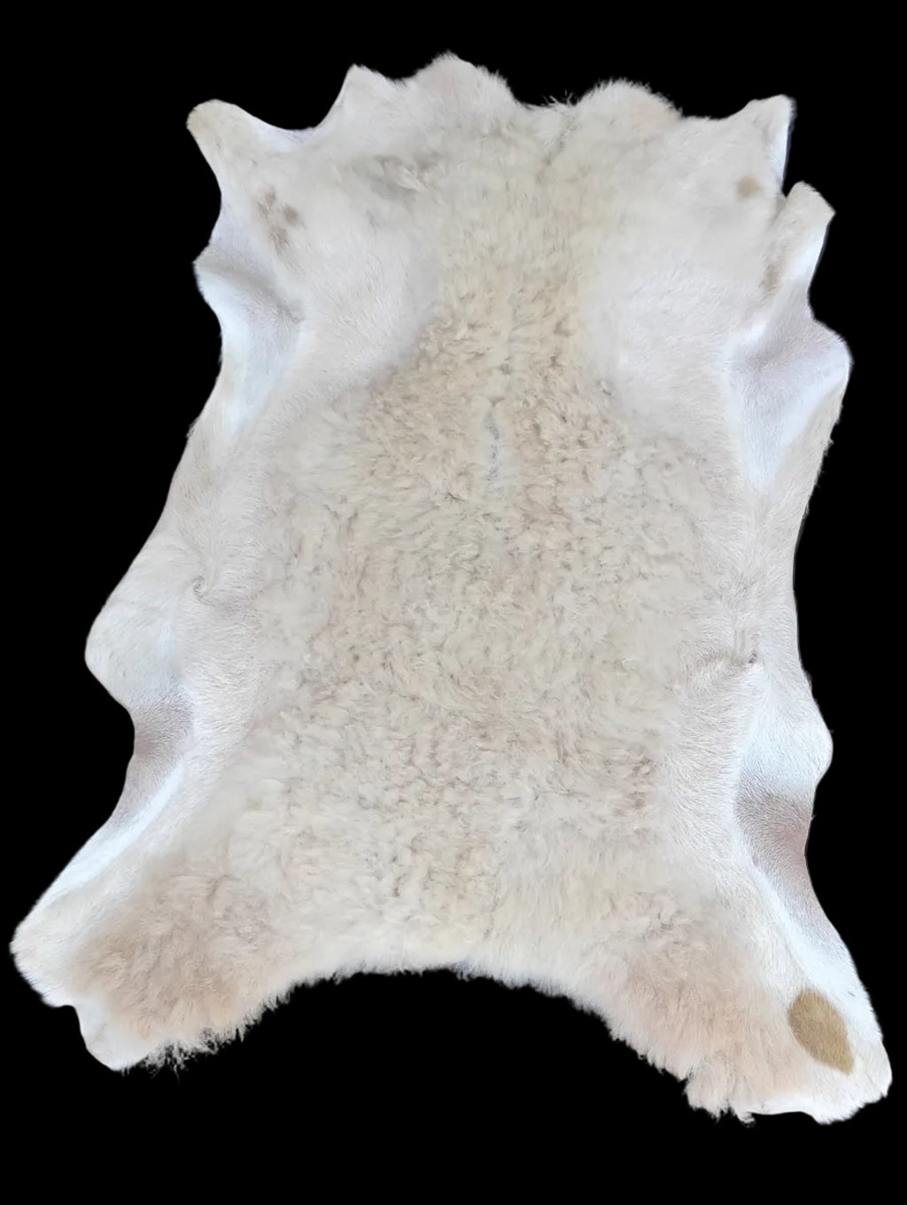 Bark tanned sheepskin 33 x 25 / silky hair