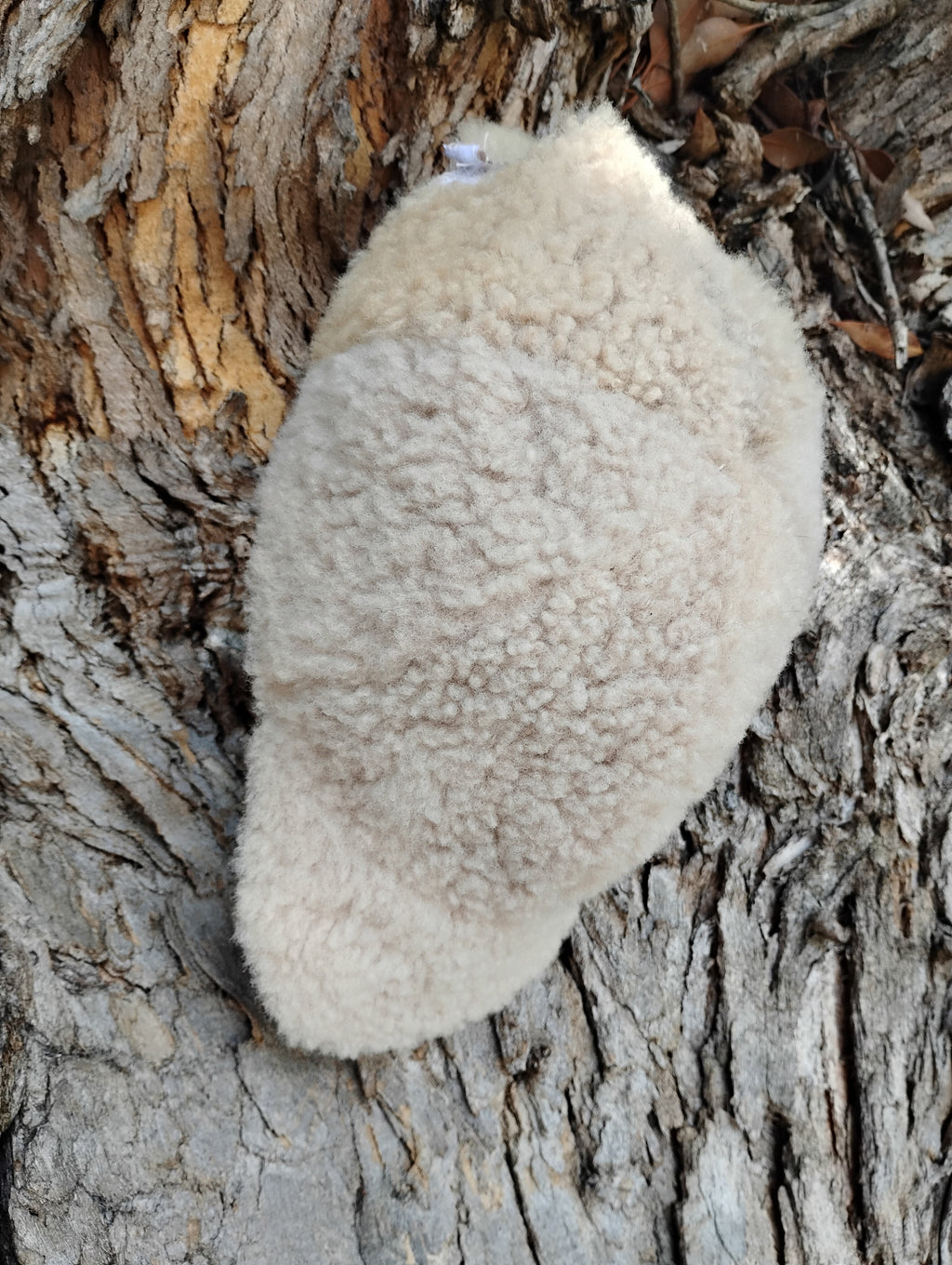 Adjustable shearling cap adult size