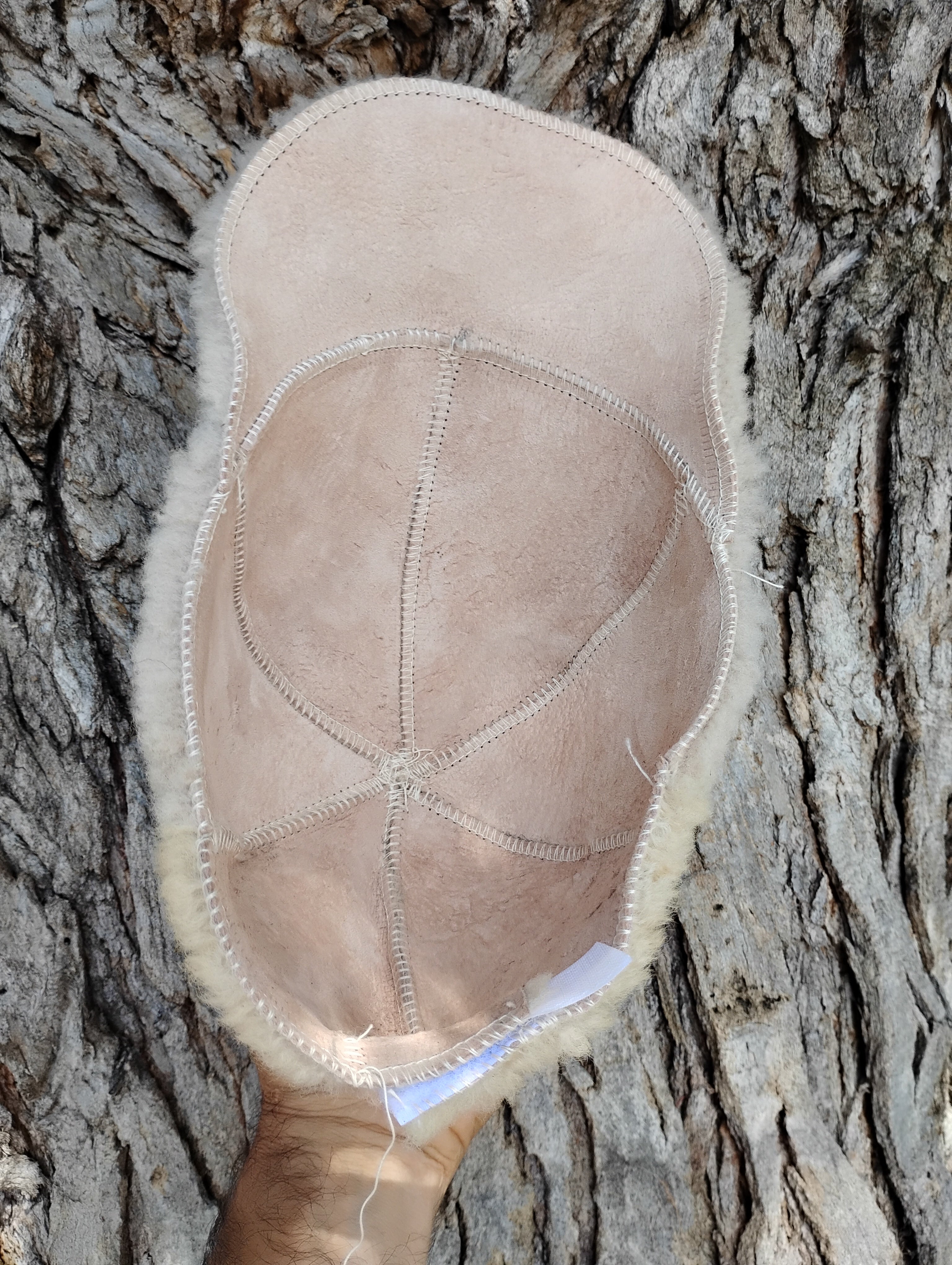 Adjustable shearling cap adult size