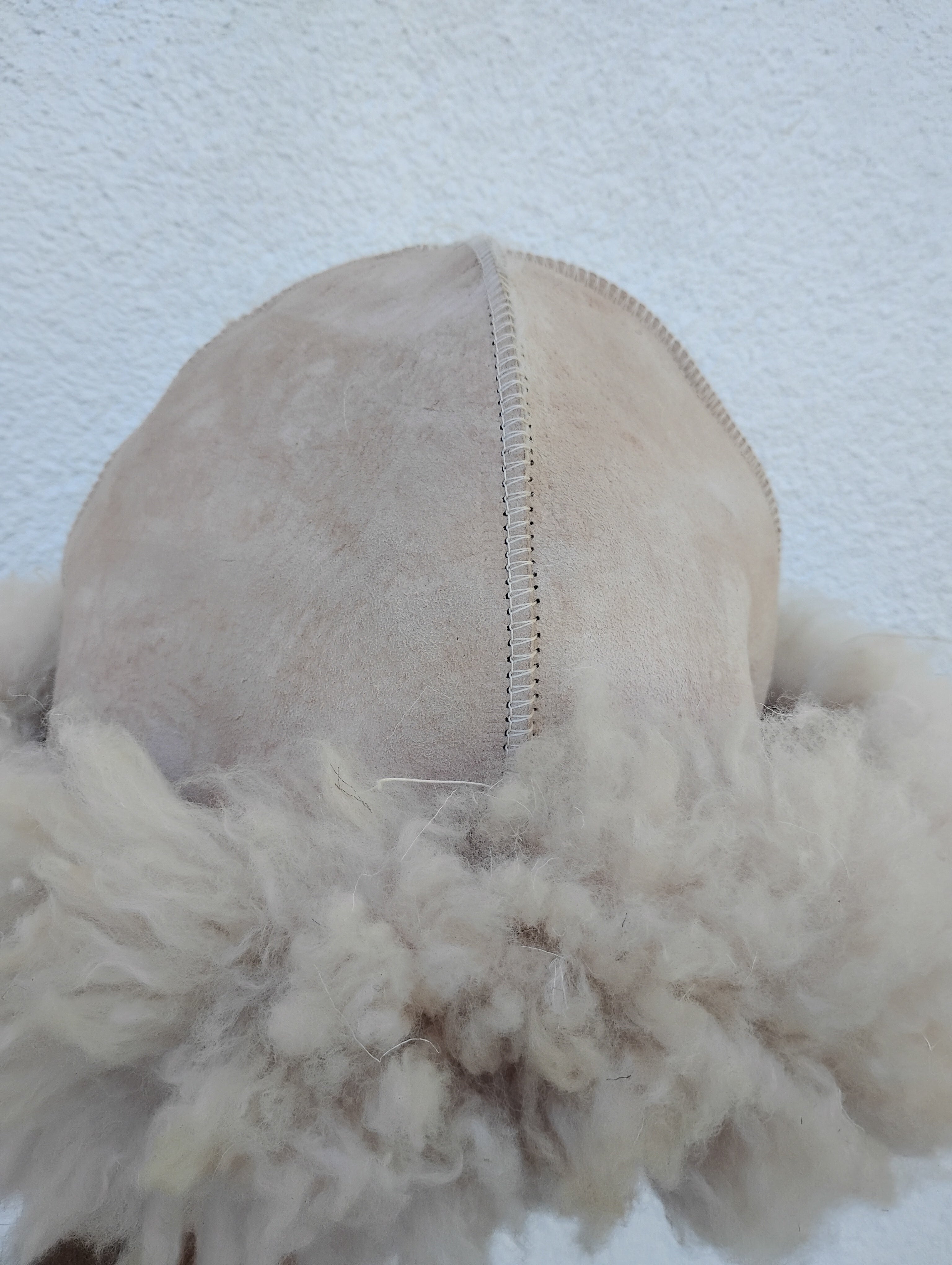 Classic hat wool side in sizing snug on 23.5 inch head
