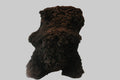 Brown textured stool on a white floor 
