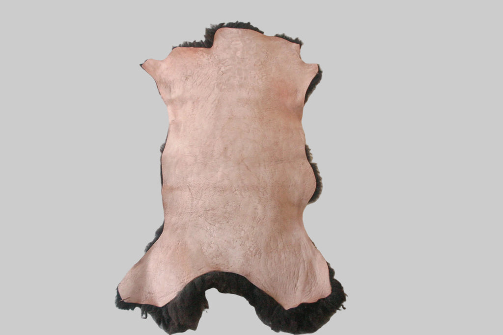 leather hide on a white surface