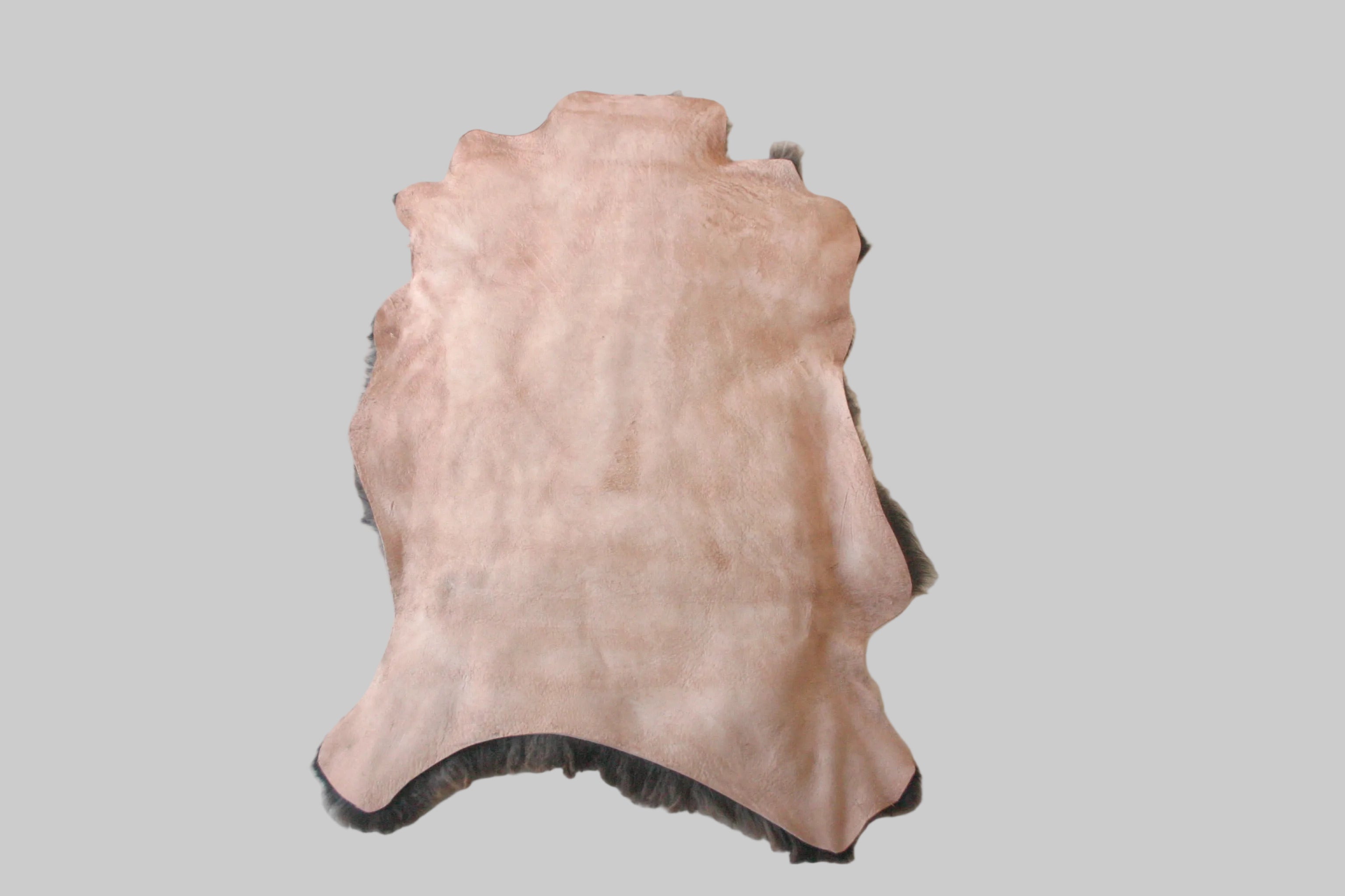 Hides of animal skin on a white surface