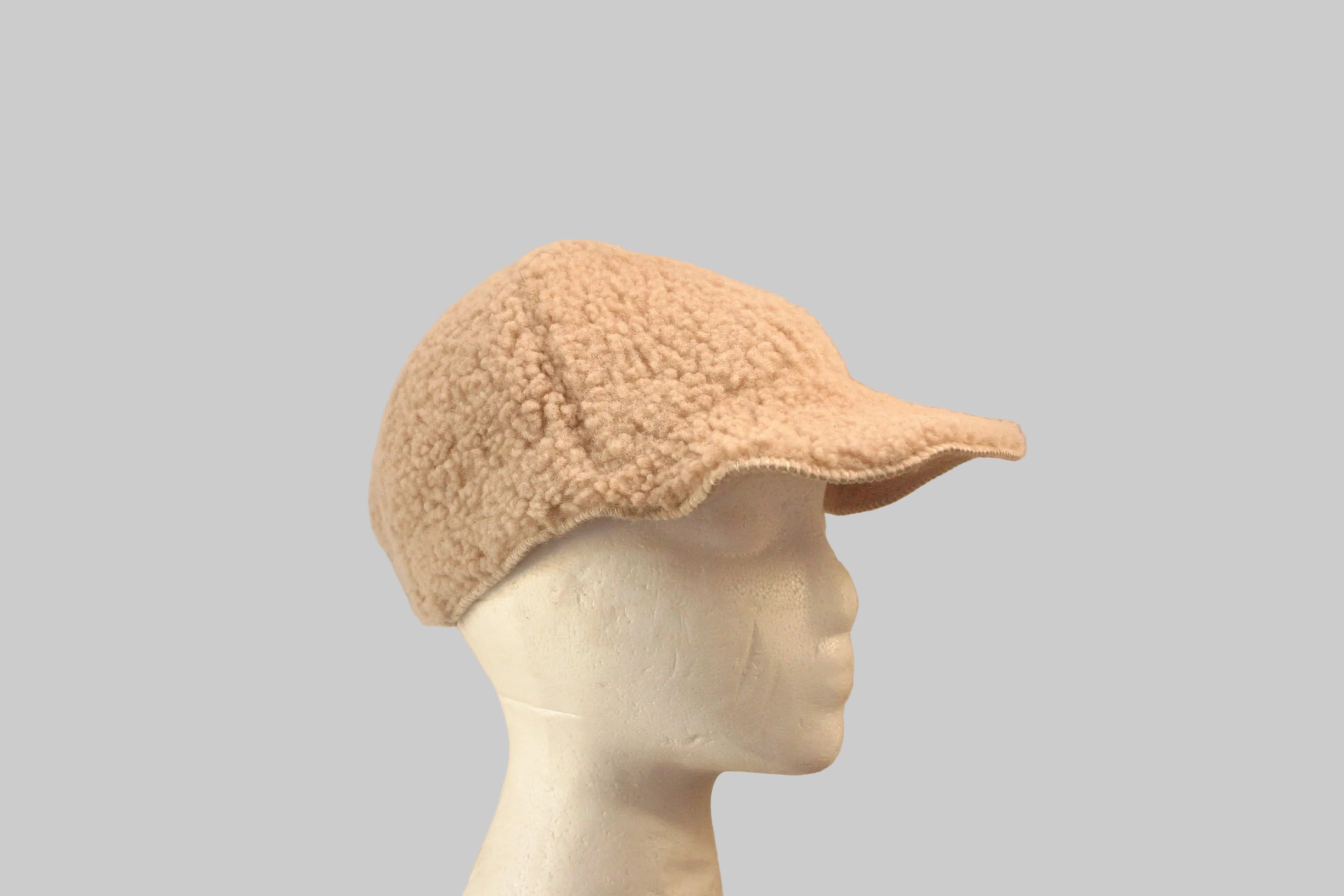 Sheepskin adjustable cap