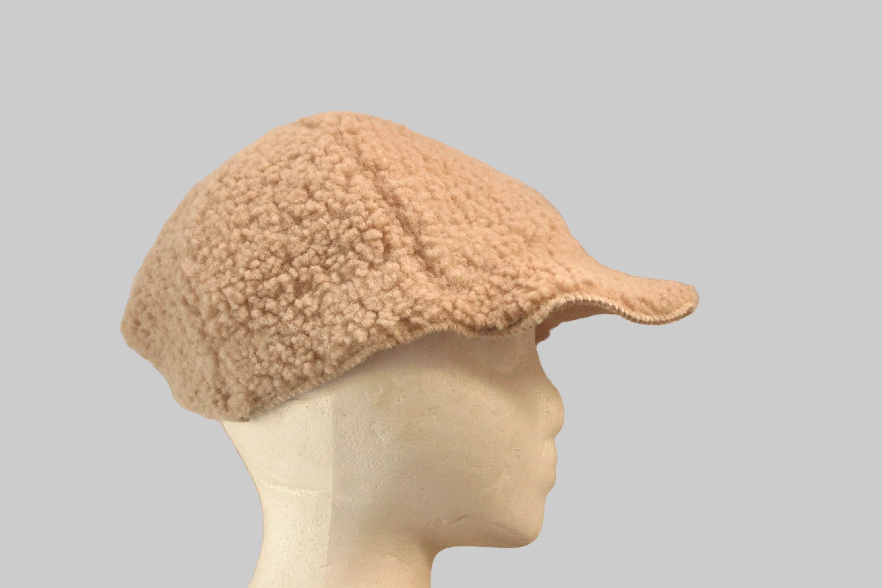 Sheepskin adjustable cap