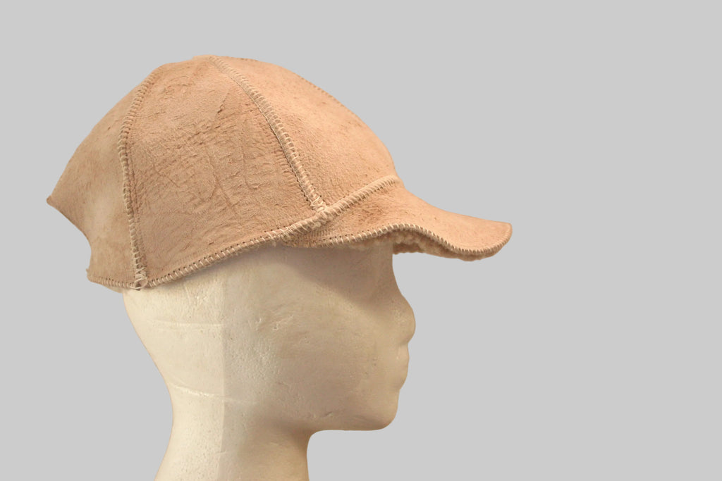 Sheepskin adjustable cap